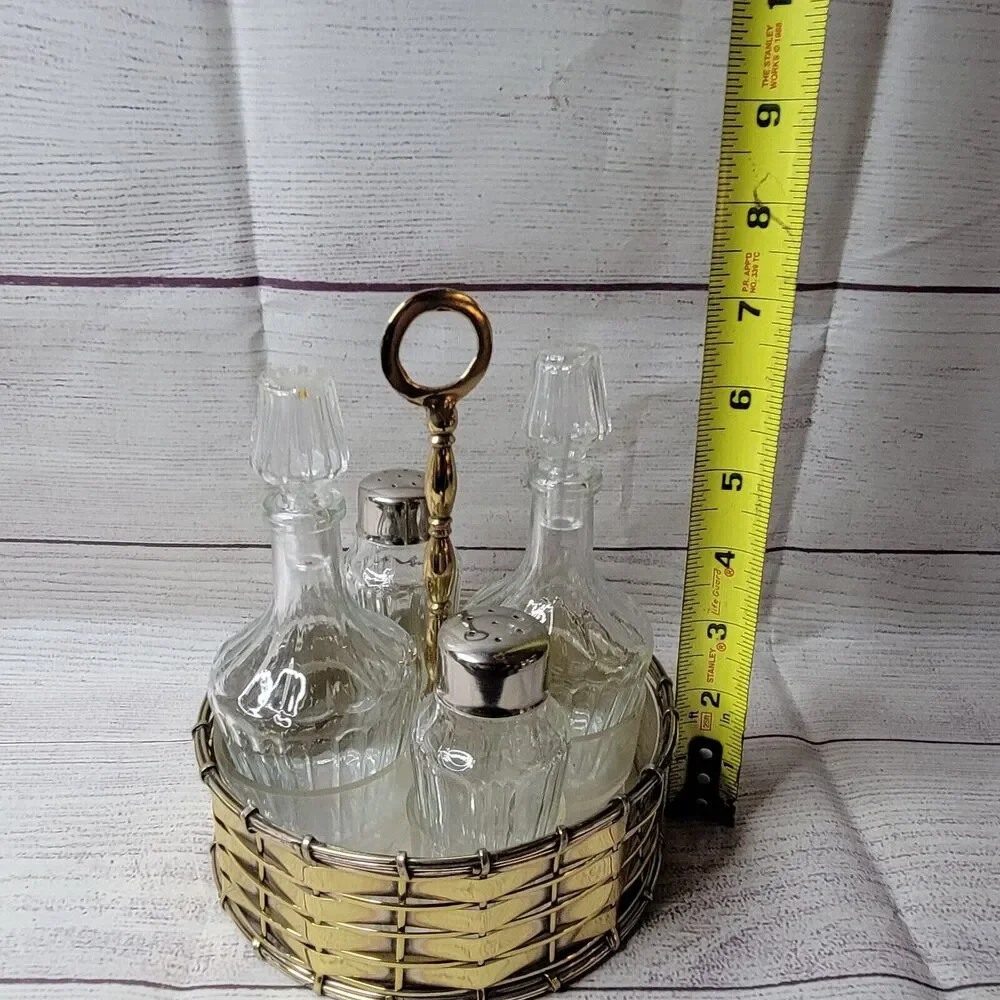 Vintage brass salt, pepper, vinegar, and oil jars with holder table-centerpiece